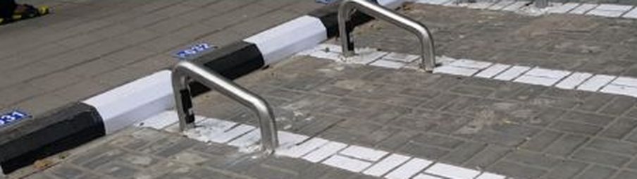 Motorcycle detection sensor installed in a two-wheeler bay